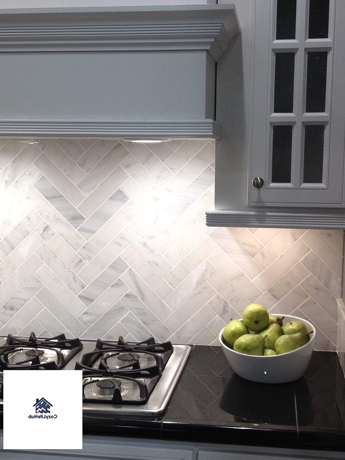 21 Marble Herringbone Backsplash Ideas That Look Expensive But Aren't 10 Herringbone Accent Behind the Range Only