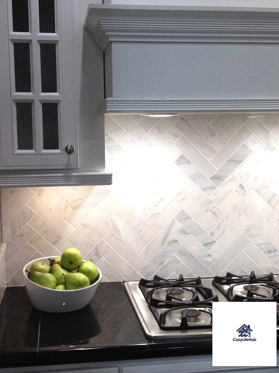 21 Marble Herringbone Backsplash Ideas That Look Expensive But Aren't 22 Herringbone Backsplash with a Marble Slab Ledge