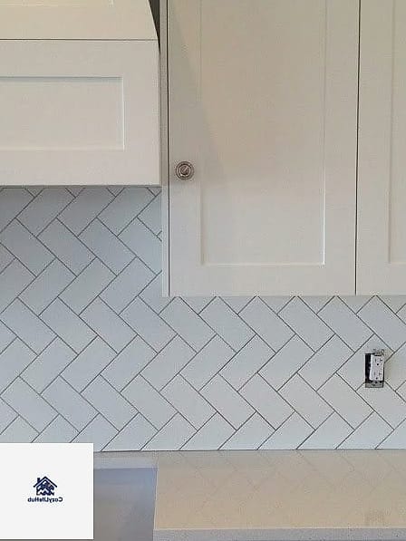 21 Vertical Subway Tile Ideas for Every Home Style and Budget 4 Herringbone Meets Vertical Subway Tile