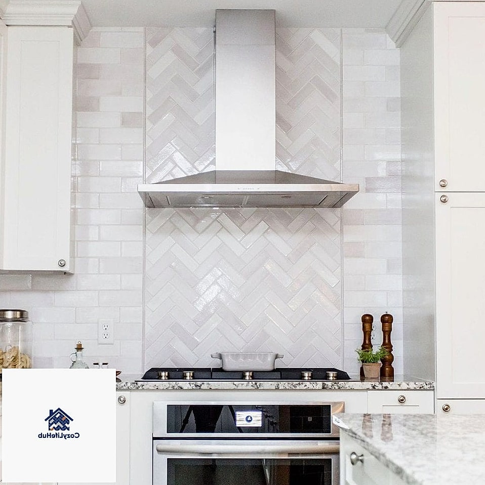 17 Antiqued Ivory Subway Backsplash Ideas Perfect for Any Budget 3 Herringbone Pattern for Extra Movement
