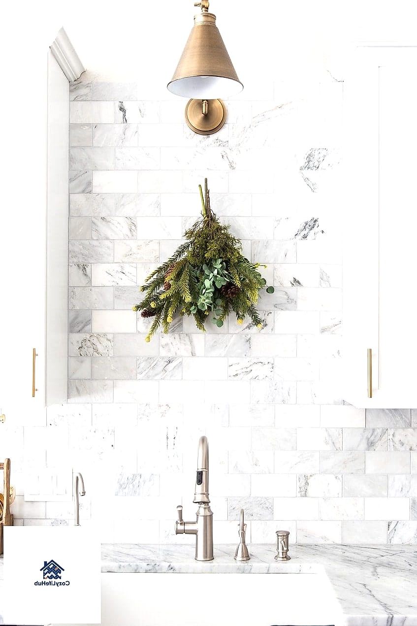 Marble Backsplash Paired with a Farmhouse Sink