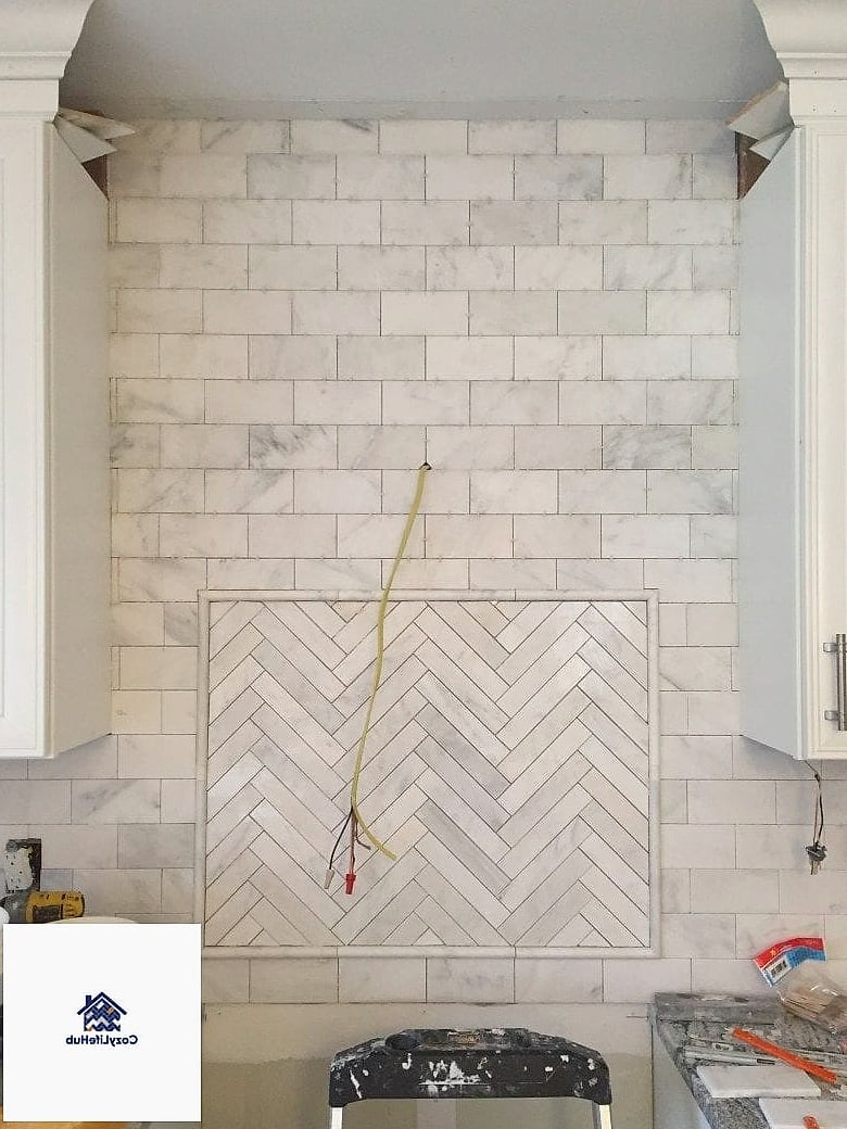 13 White Marble Backsplash Ideas That Designers Keep Coming Back To 4 Marble Subway Tile with Beveled Edges