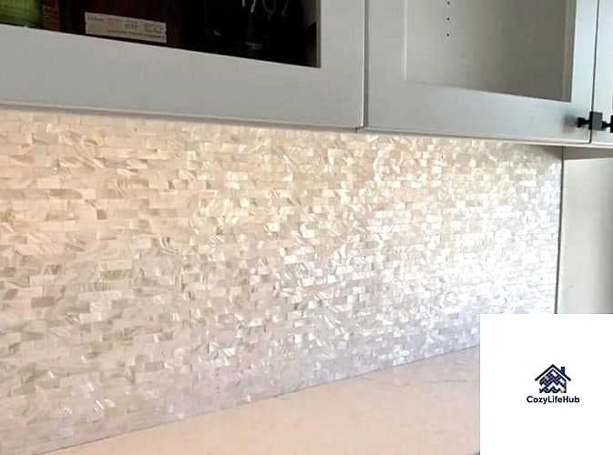 21 Shell Backsplash Ideas Worth Stealing From Interior Designers 3 Mother of Pearl Mosaic in Herringbone Pattern