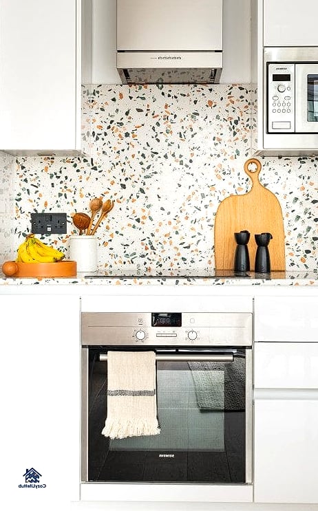 19 Terrazzo Backsplash Ideas That Look Expensive But Aren't 12 Terrazzo as a Focal Wall Behind Floating Shelves