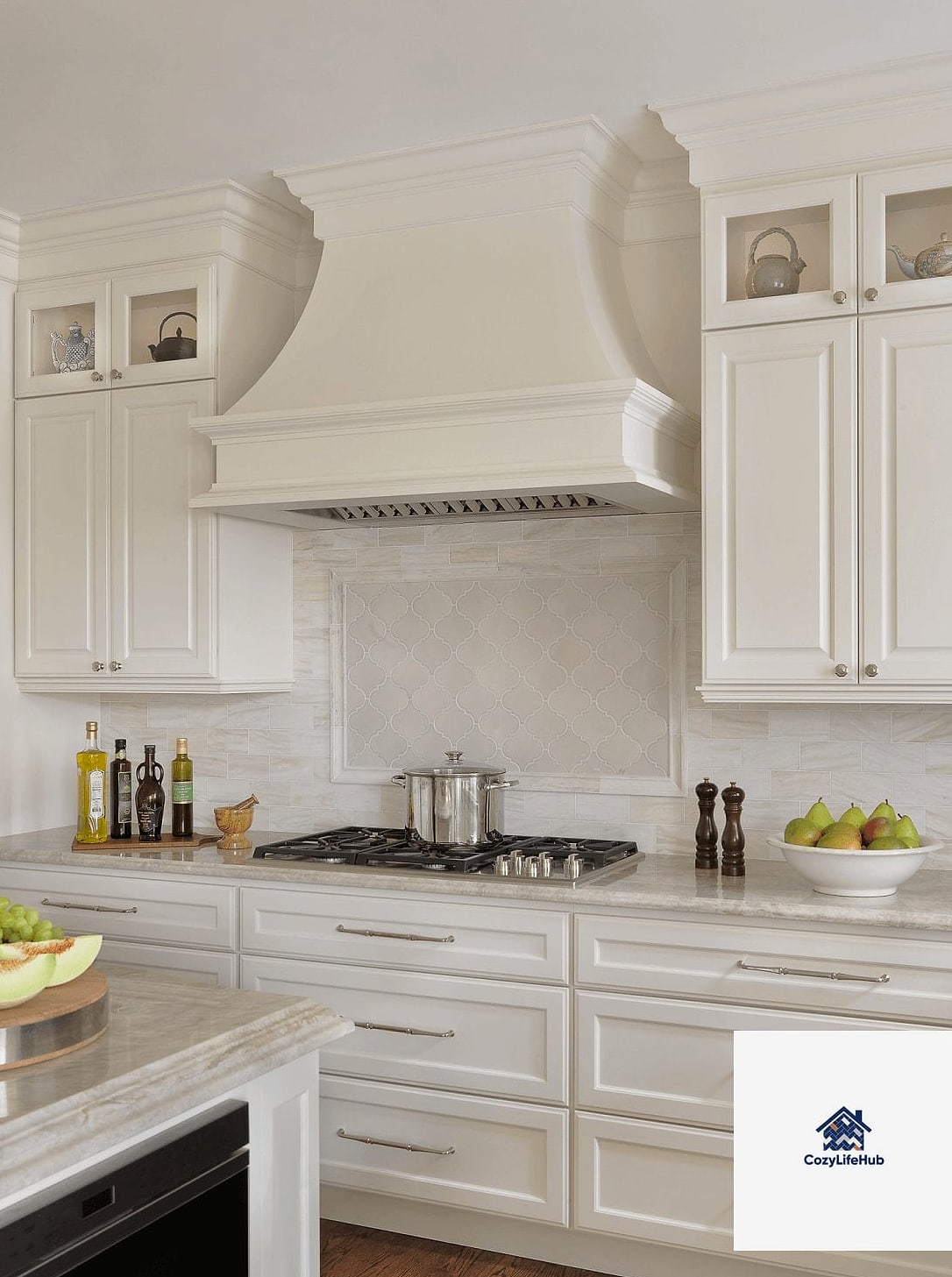 White Cabinets with a Statement Range Hood
