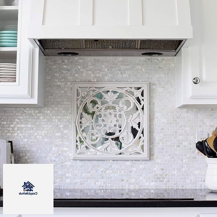 21 Shell Backsplash Ideas Worth Stealing From Interior Designers 4 White Shell Tile Paired with Brushed Brass Hardware