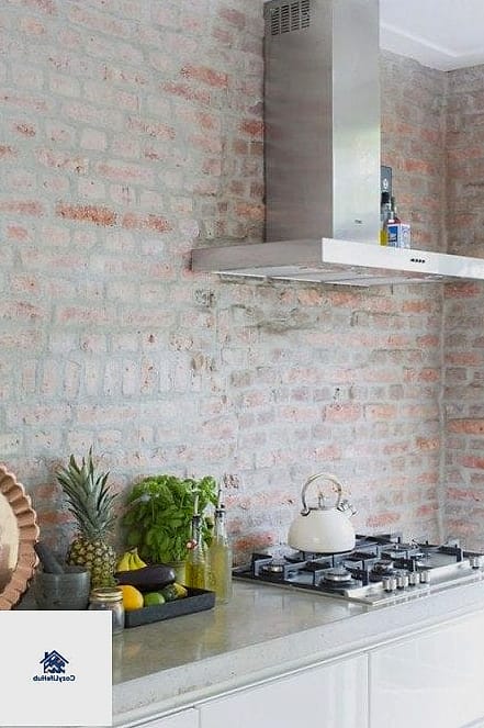 18 White Brick Backsplash Ideas You Haven't Seen Before 2 Whitewashed Brick with Visible Red Undertones